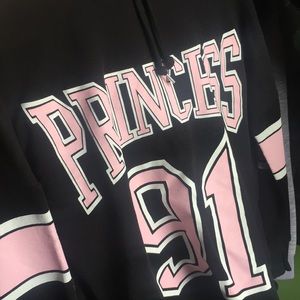 A black and pink hoodie